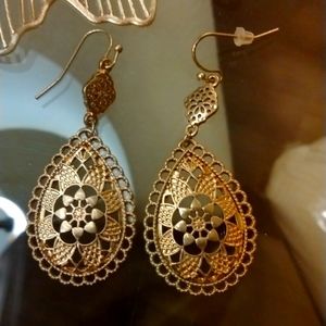 Golden Teardrop shaped earrings.